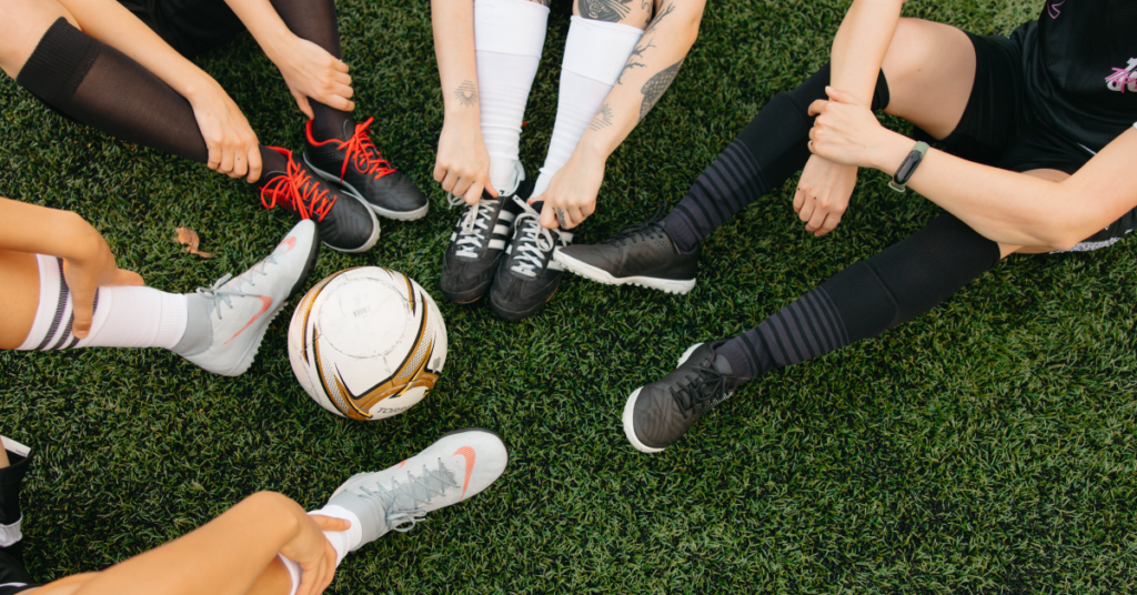 People playing soccer in compression socks