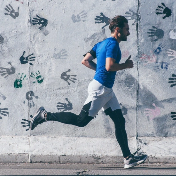 A man ruuning with compression gear