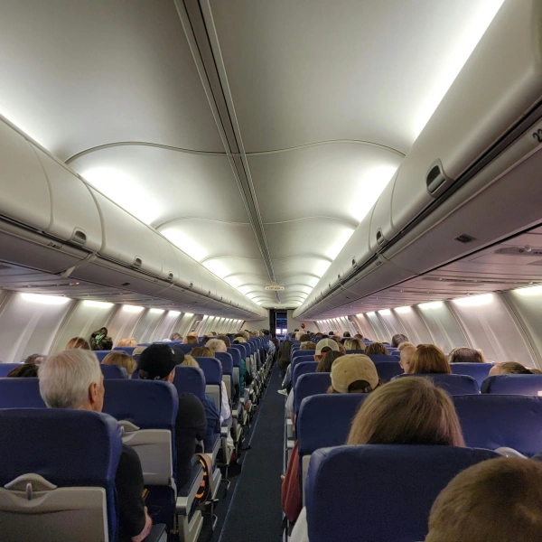 Interior of commercial airplane with passenger