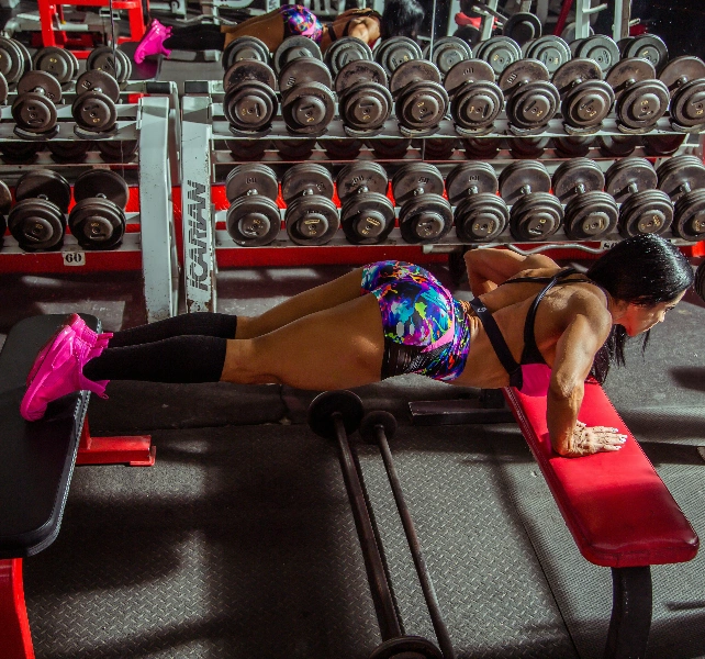 A woman wearing compression socks for exercise