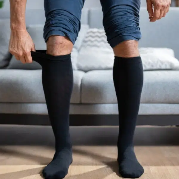 A man wearing compression socks