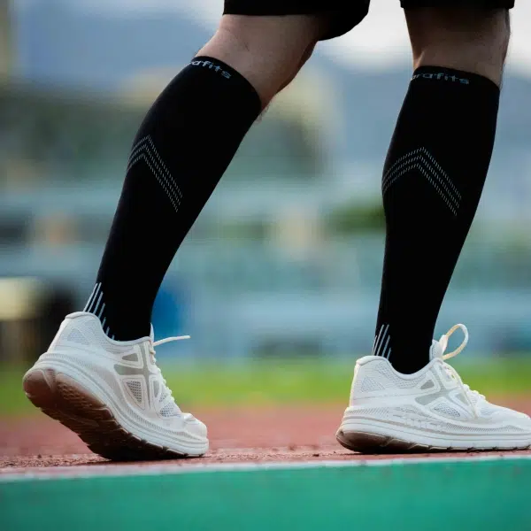 A man wearing compression socks