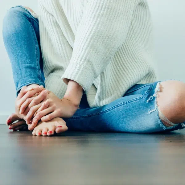 A person is experiencing pain due to poor circulation