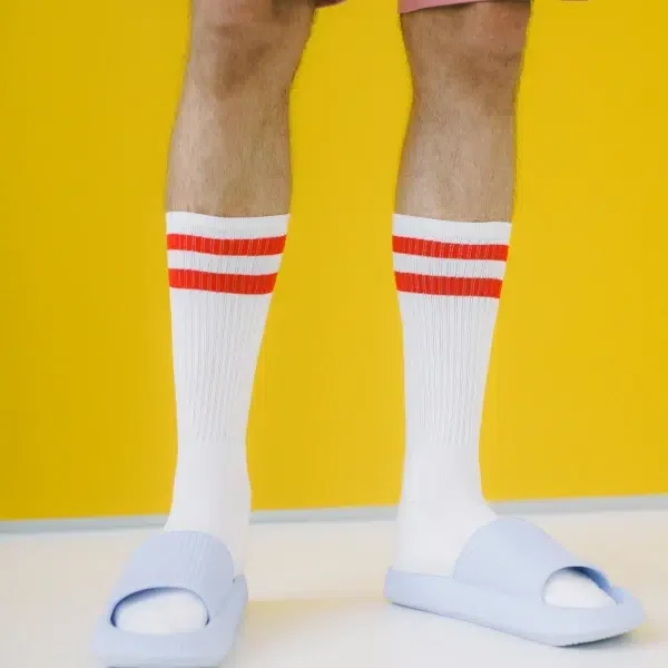 A man wearing compression socks